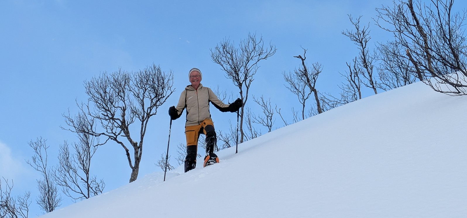 Snowshoeing at Ringstad Resort in winter mountain scenery