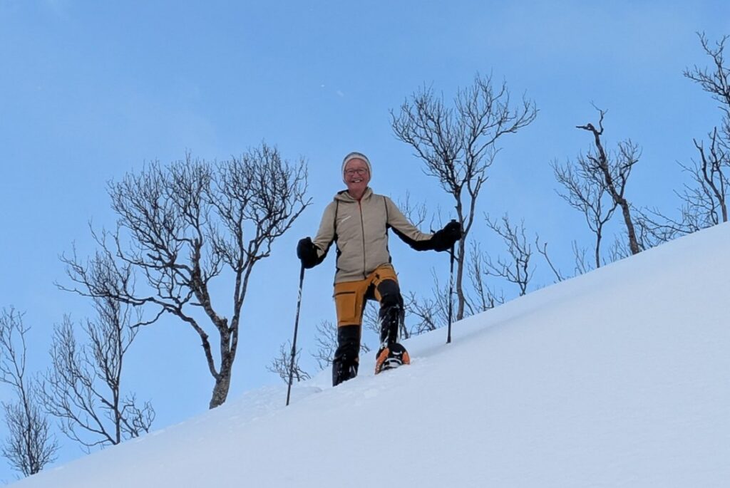 Snowshoeing at Ringstad Resort in winter mountain scenery