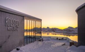 Ringstad Resort main building by the water at sunset in winter